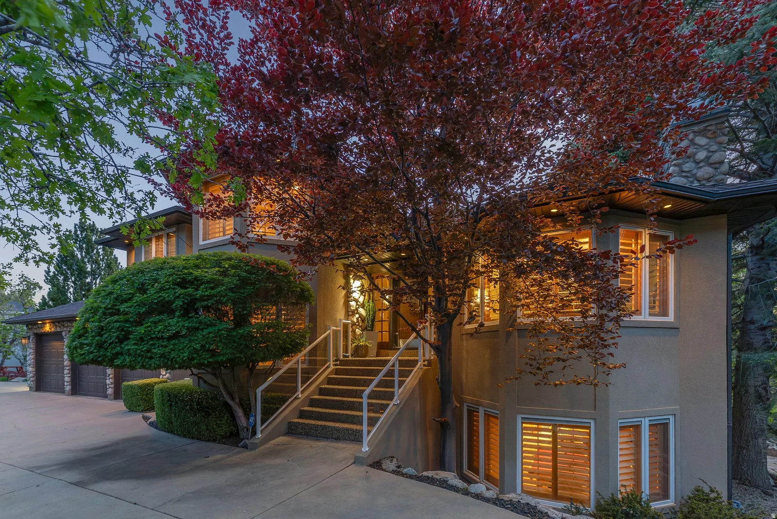 View of front of property featuring stucco siding and driveway